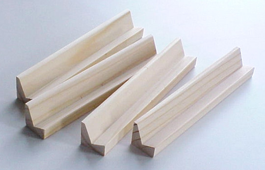 A set of 4 plain pine domino racks